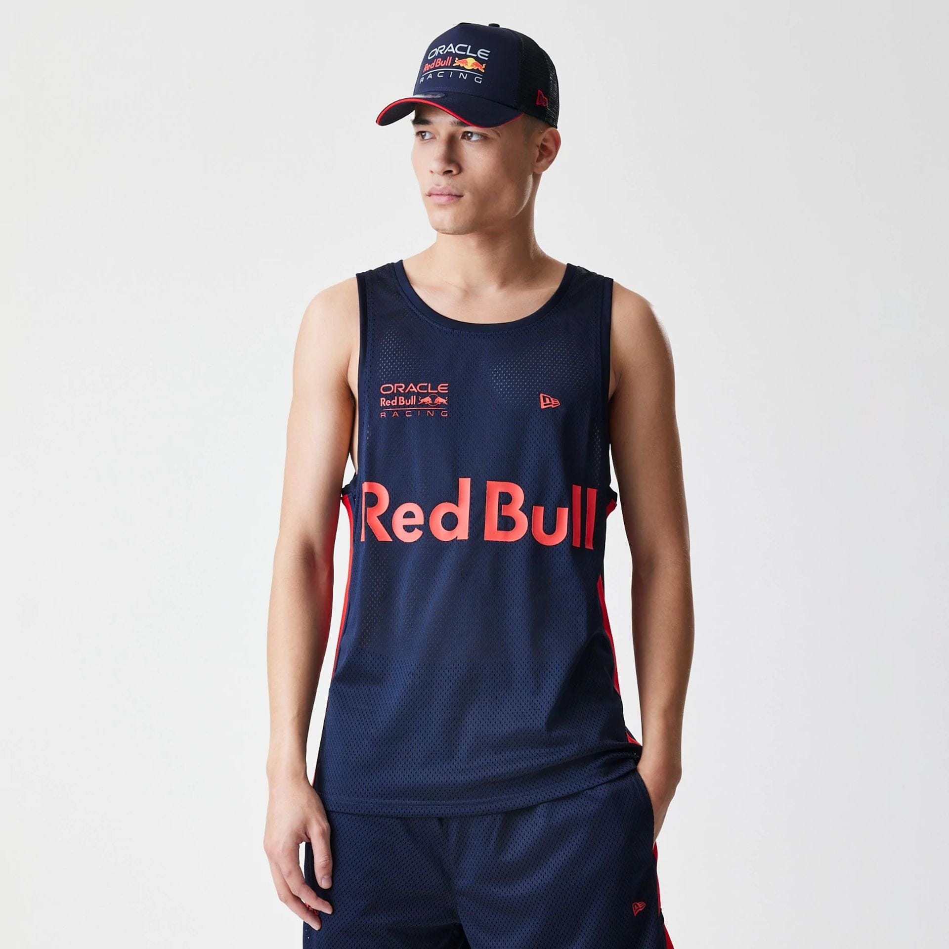 The Male model is wearing Red Bull Racing Basketball Mesh Dark Blue Sleeveless T-Shirt 1