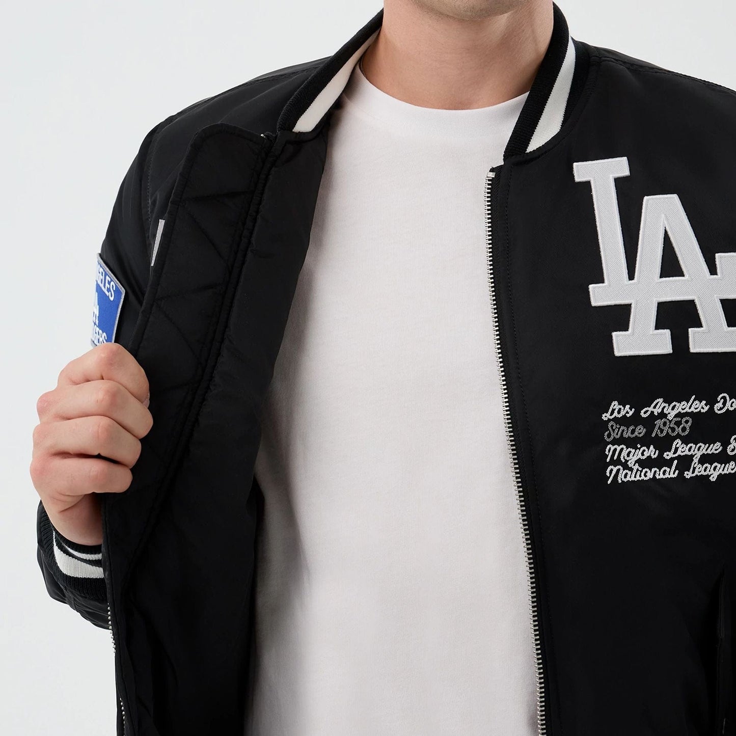 The Male model is wearing LA Dodgers MLB X Alpha Black Bomber Jacket 7
