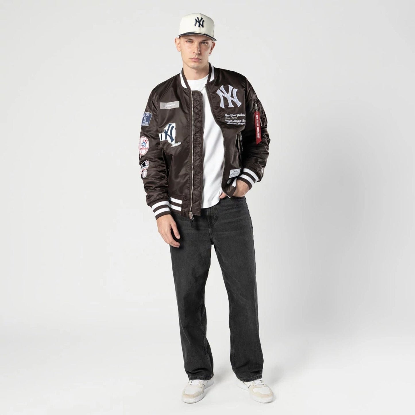 The Male model is wearing New York Yankees MLB X Alpha Dark Brown Bomber Jacket 5