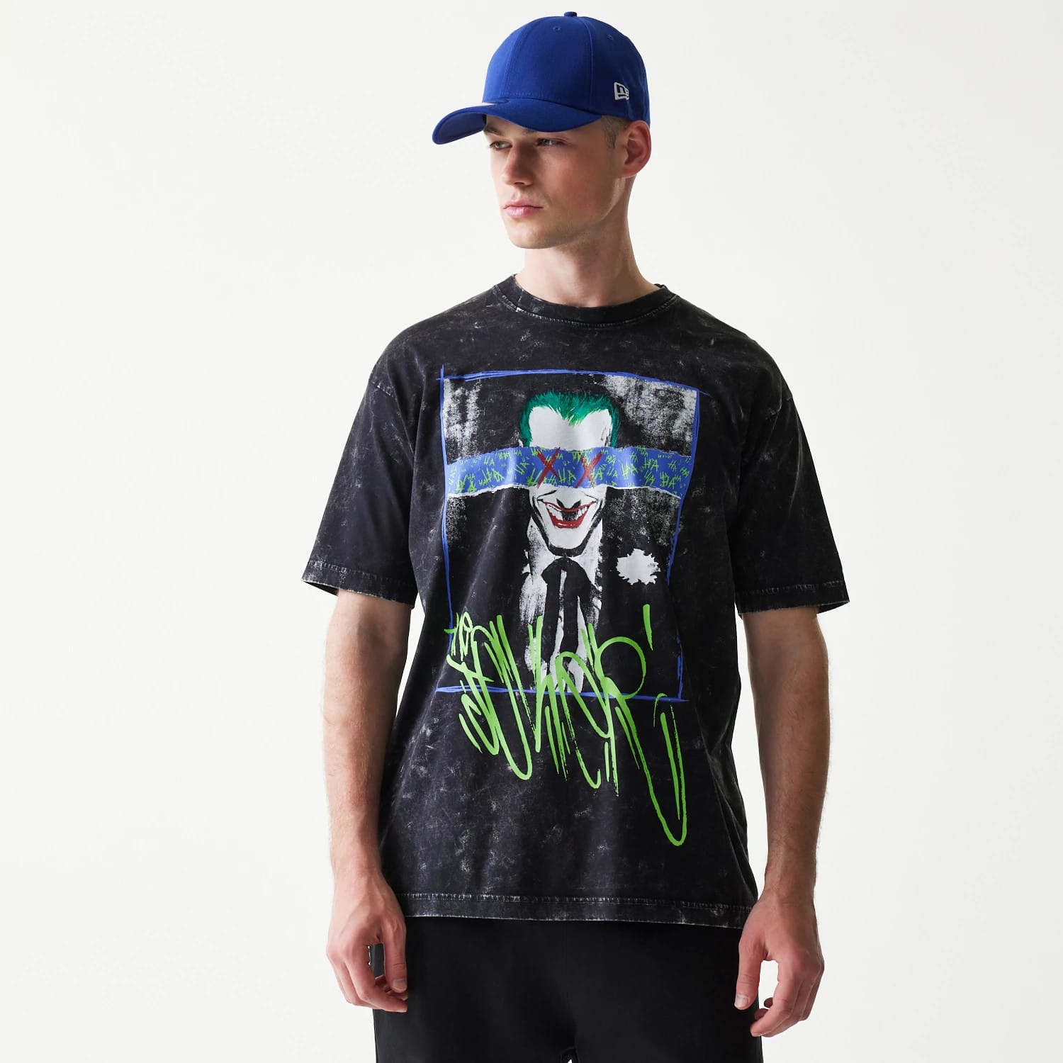 The Male model is wearing Joker Batman Black T-Shirt 1