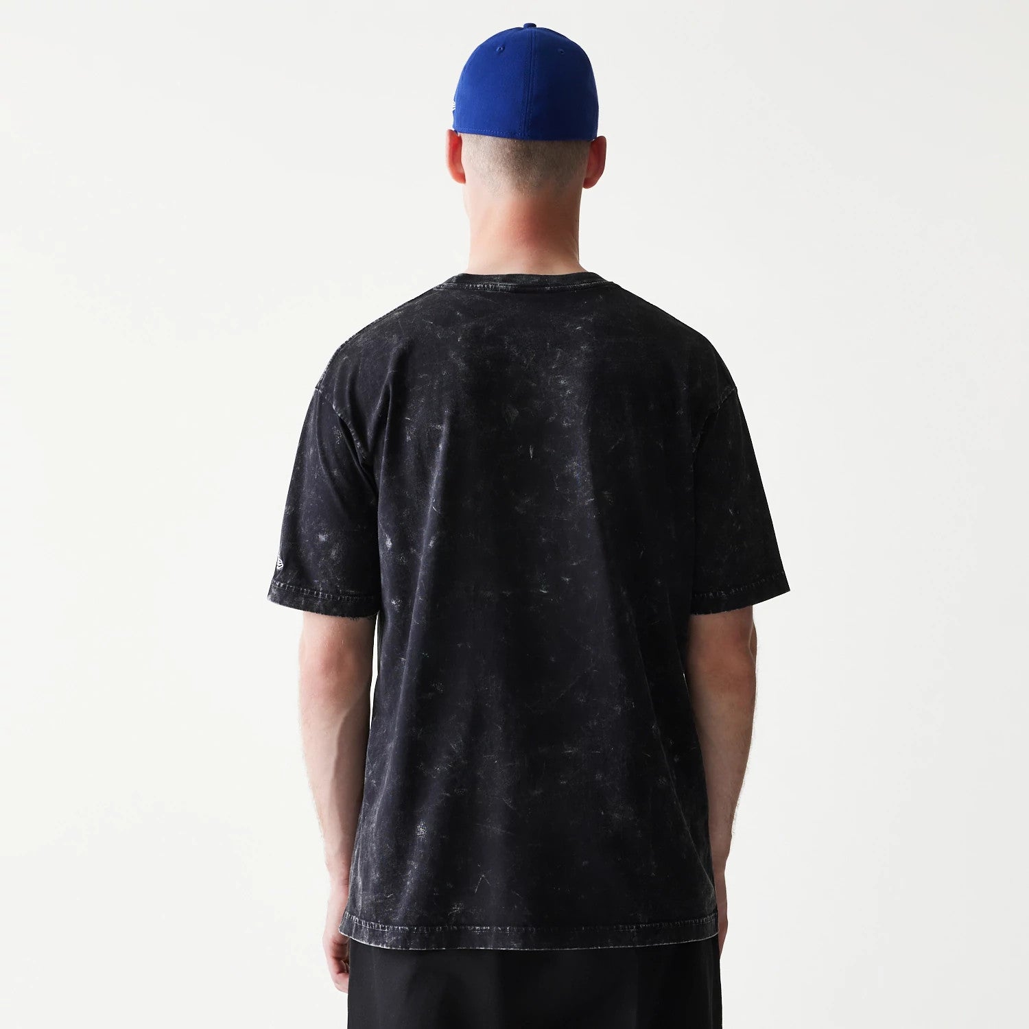 The Male model is wearing Joker Batman Black T-Shirt 2