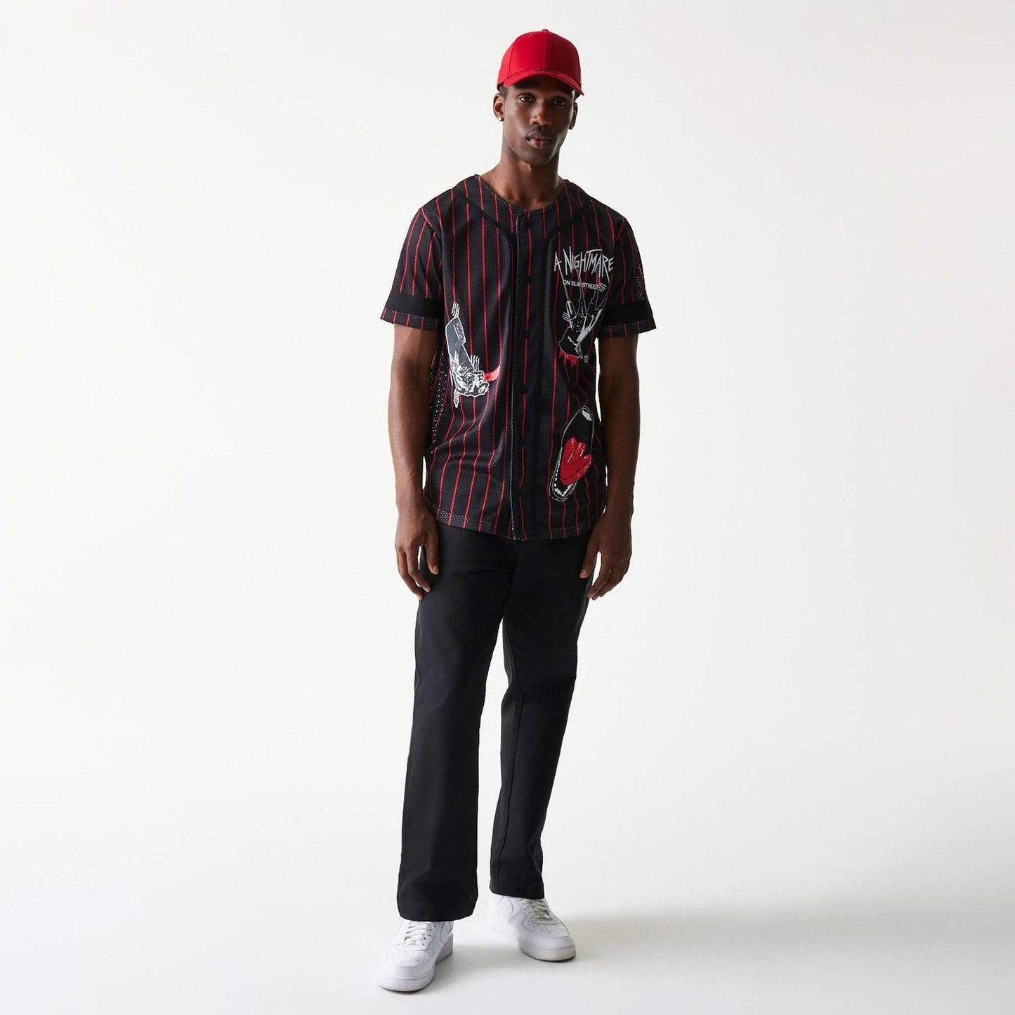 The Male model is wearing A Nightmare On Elm Street Black Jersey 8