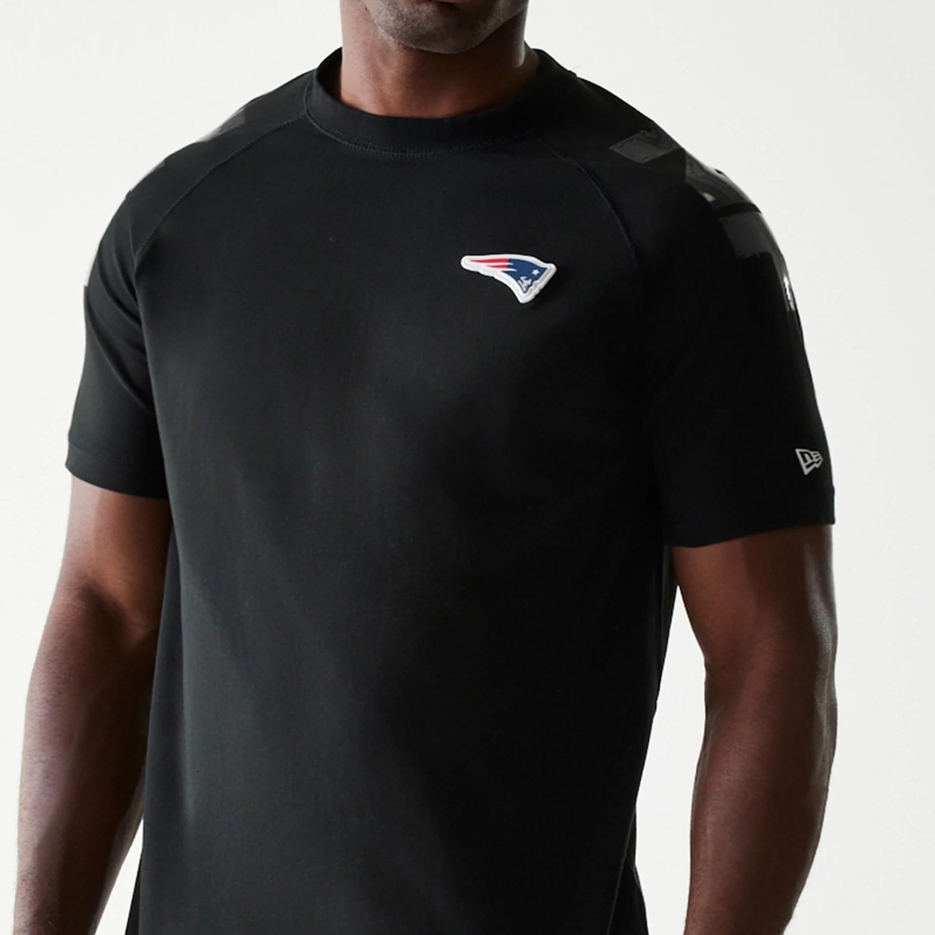 The Male model is wearing New England Patriots NFL 3RD Down Black T-Shirt 2