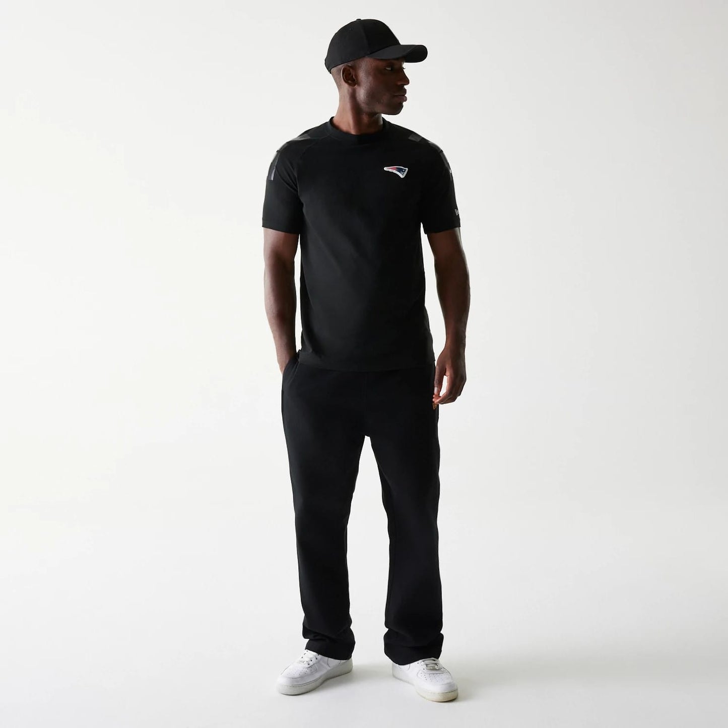 The Male model is wearing New England Patriots NFL 3RD Down Black T-Shirt 8