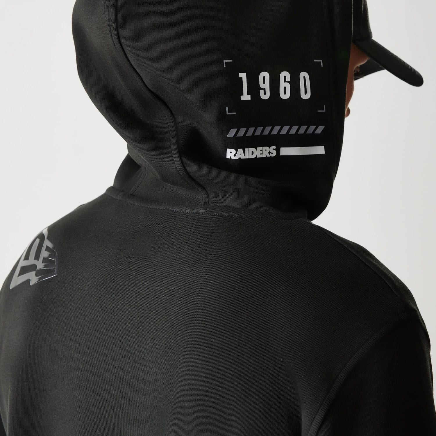 The Male model is wearing Las Vegas Raiders NFL 3RD Down Black Pullover Hoodie 3