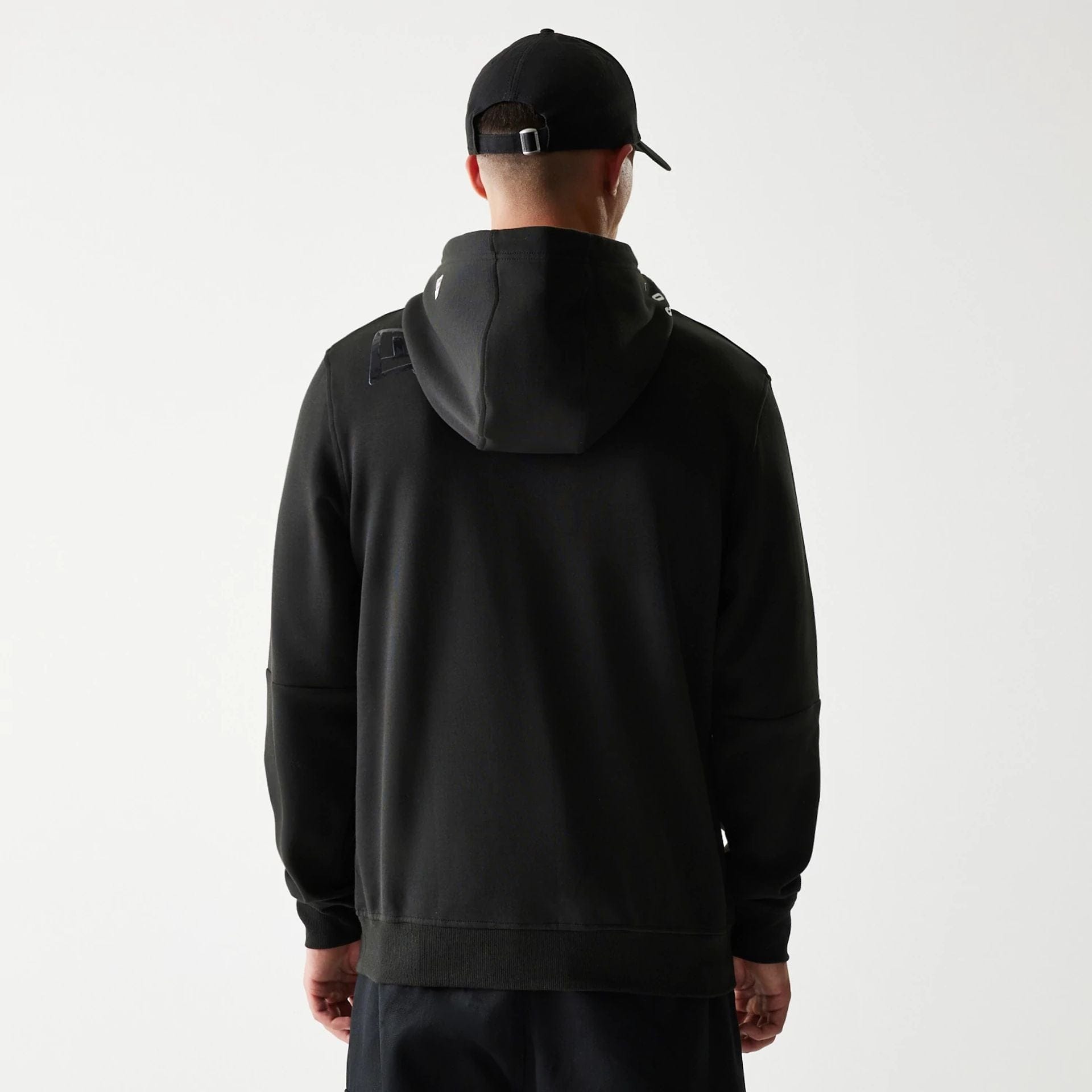 The Male model is wearing Las Vegas Raiders NFL 3RD Down Black Pullover Hoodie 2