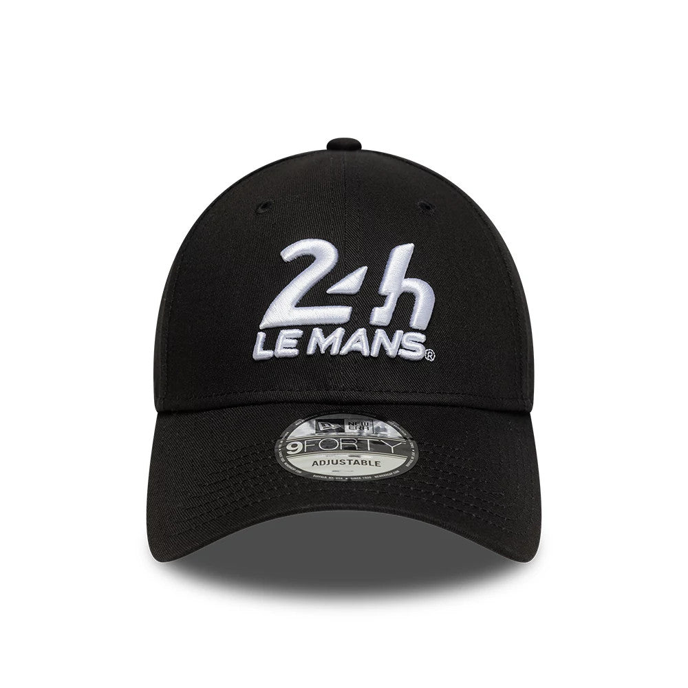 24HR Le Mans Core Black New Era 9FORTY Adjustable Cap, front view showing the white embroidered 24HR Le Mans logo on the structured black crown, with a slightly curved visor and 9FORTY size sticker.