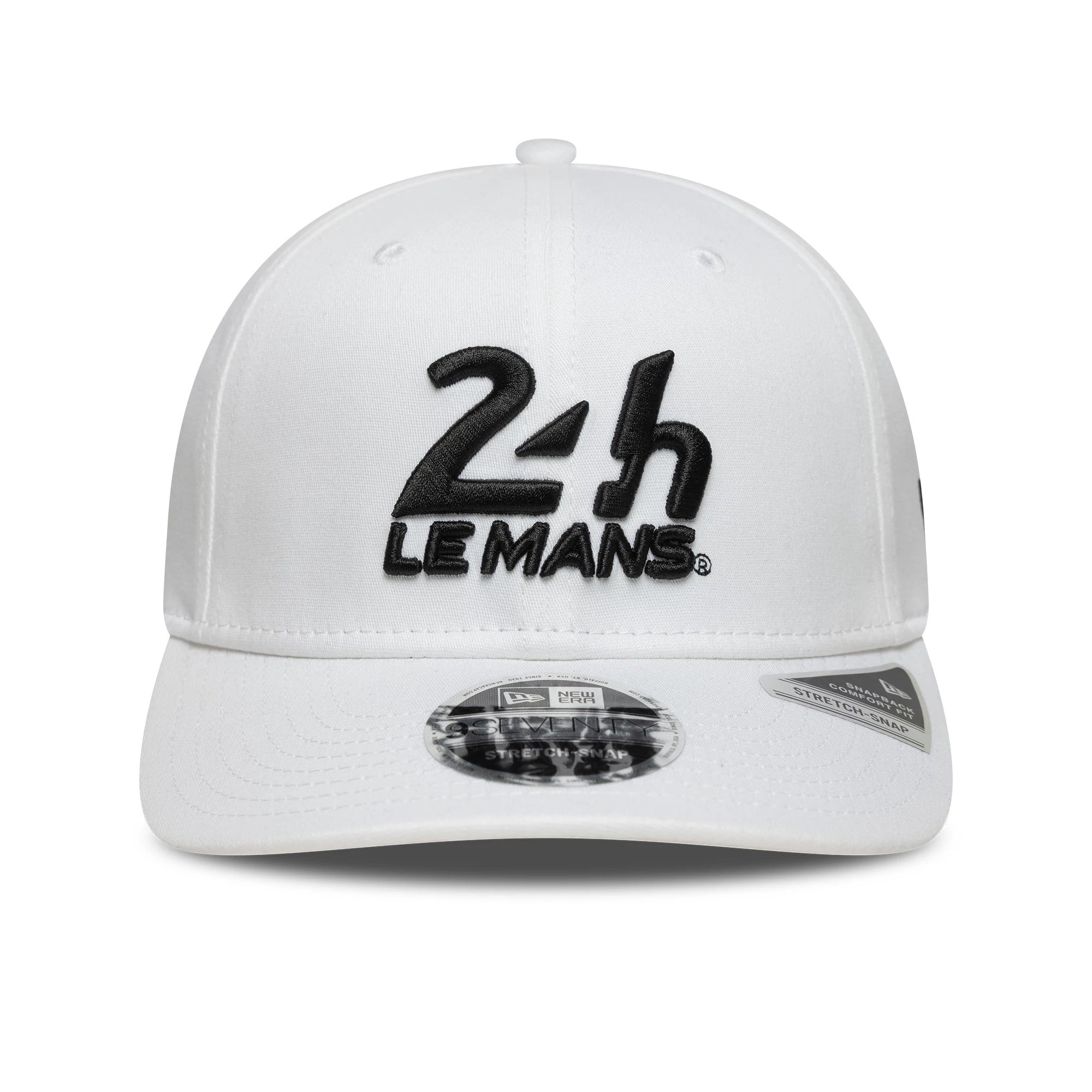 24HR Le Mans Core White New Era 9SEVENTY Stretch Snap Adjustable Cap, front view showing the black raised embroidered 24H Le Mans logo on the structured white crown, with a 9SEVENTY size sticker on the curved white visor.