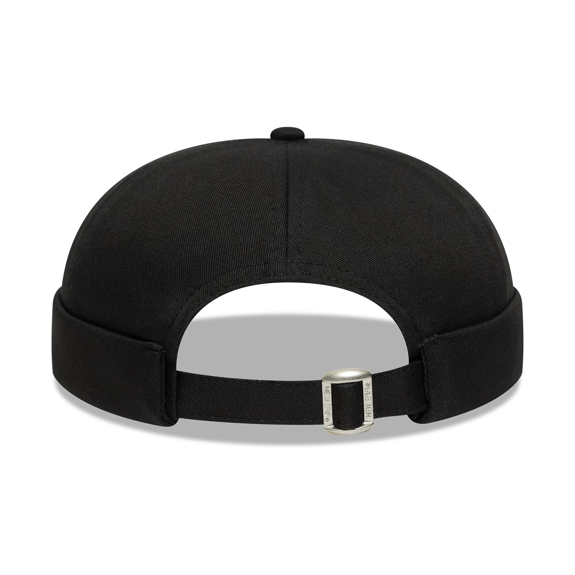New Era Cotton Twill Black Docker Hat, rear view showing the adjustable black strap with a buckle, and the fitted black twill fabric forming the structured crown and rolled edge.