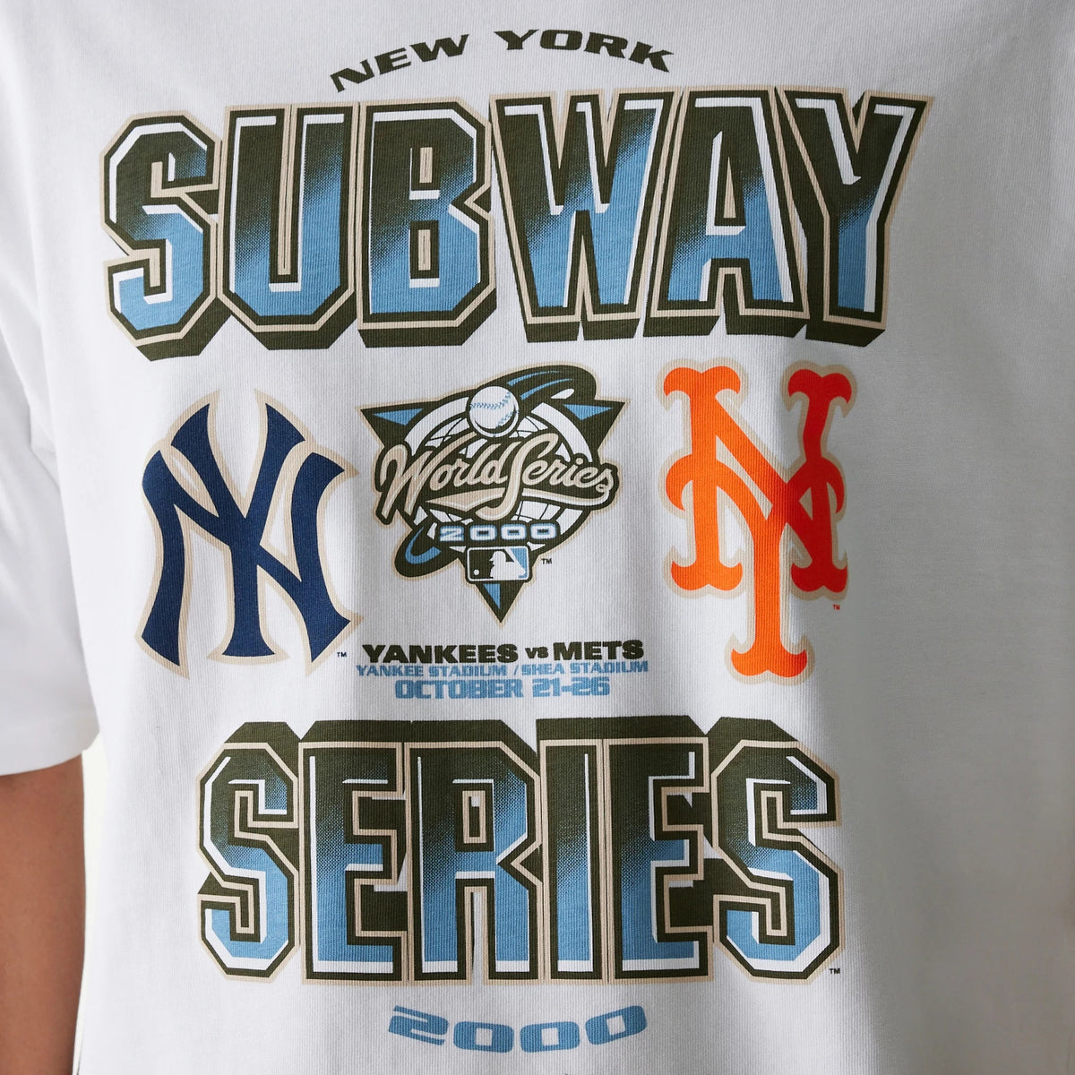 New Era MLB Subway Series White Oversized T-Shirt, front view showing large printed text SUBWAY SERIES in blue and black, New York Yankees and Mets logos, and World Series 2000 graphics across the chest.