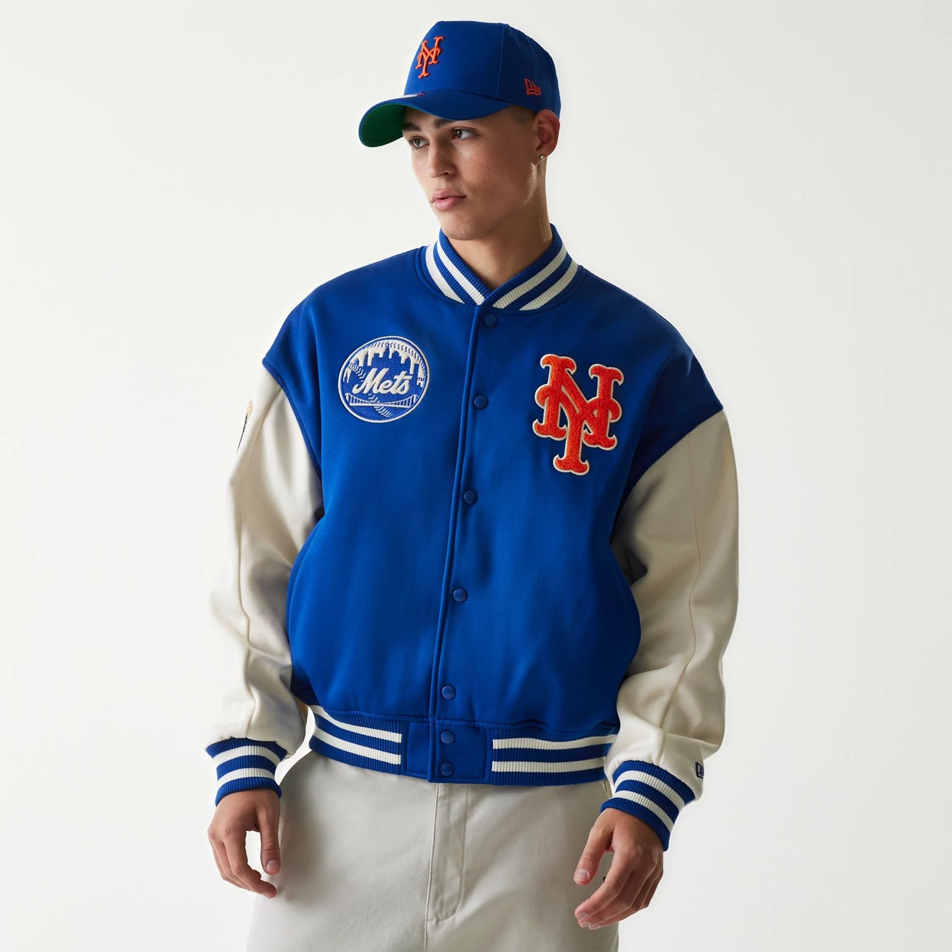 The Male model is wearing New York Mets MLB Jersey Blue Bomber Jacket 1