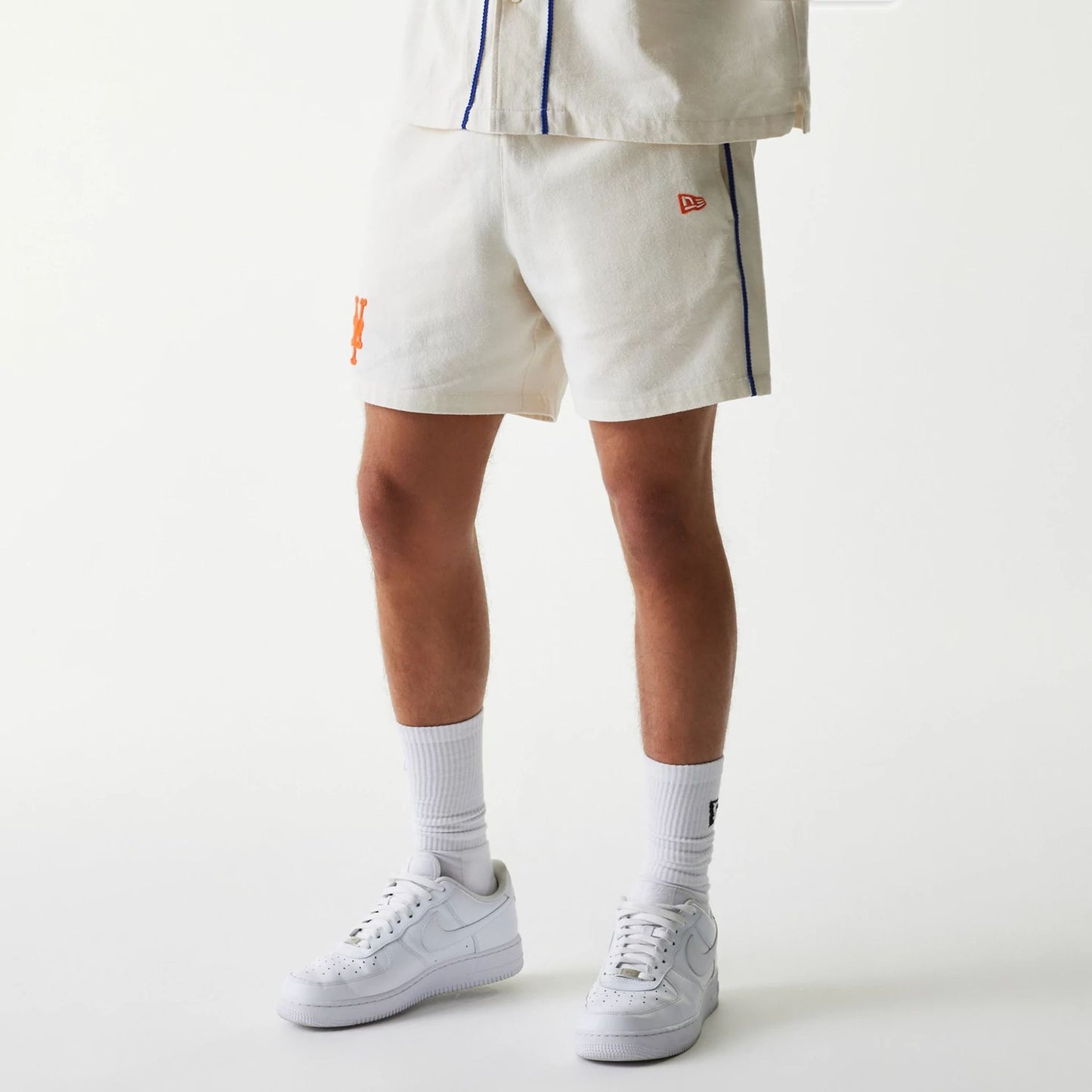 The Male model is wearing New York Mets MLB Piping Open Cream Shorts 8