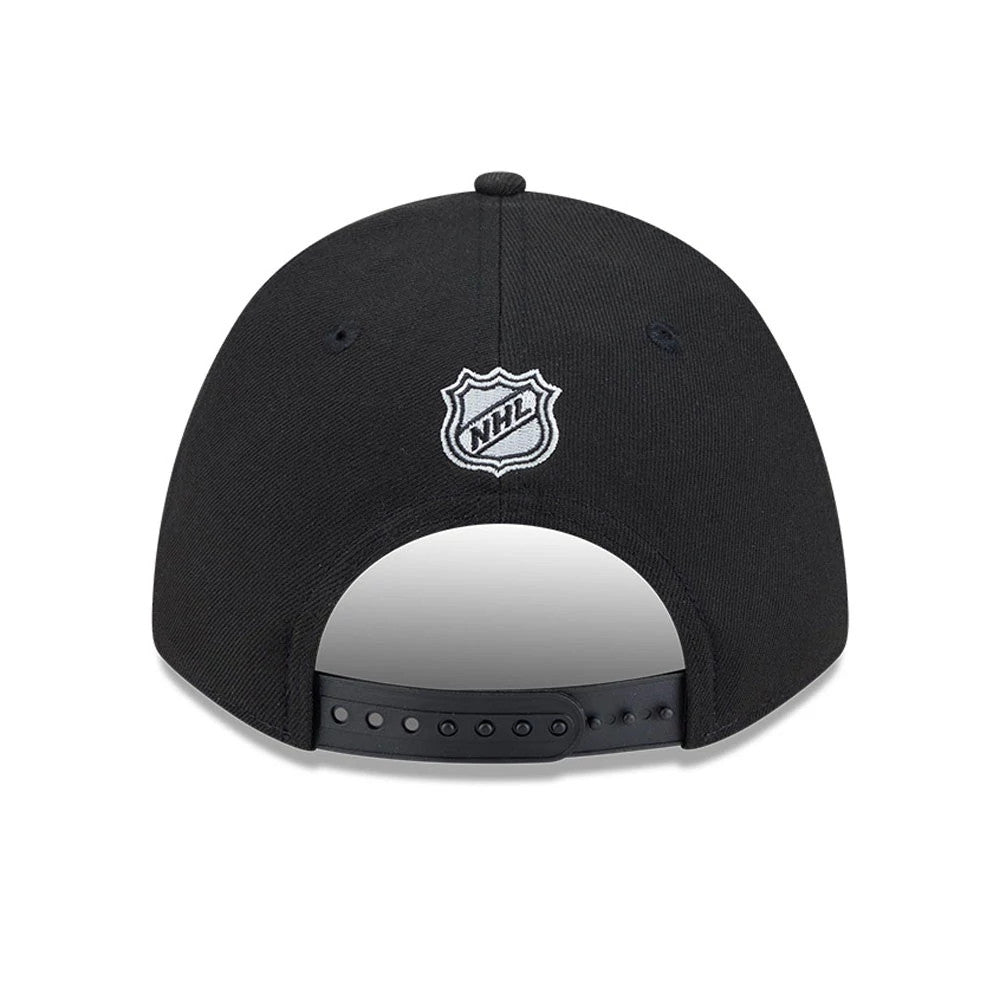 LA Kings NHL Team Black New Era 9FORTY M-Crown Adjustable Cap, rear view showing the white embroidered NHL shield logo at the centre of the back panels above the adjustable black strap.