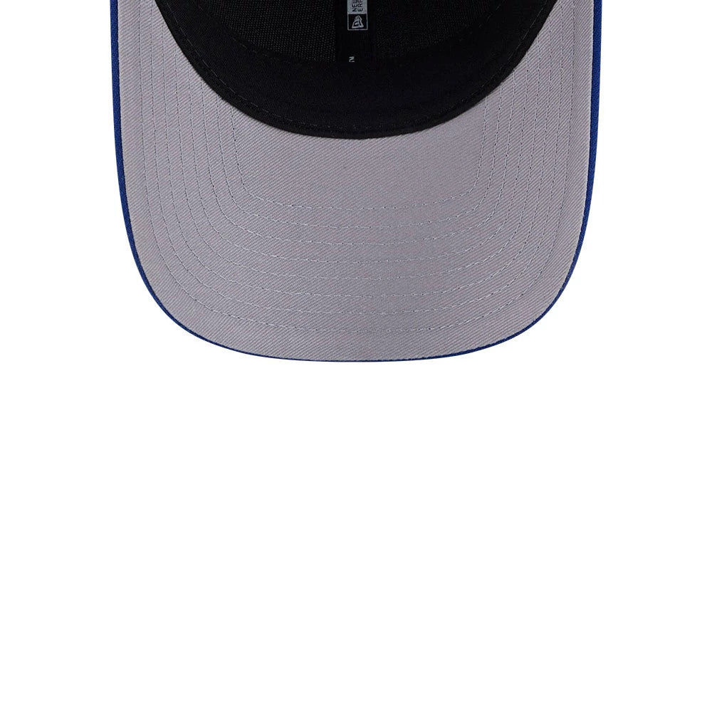Vancouver Canucks NHL Team Blue New Era 9FORTY M-Crown Adjustable Cap, inside view showing the grey undervisor with detailed stitching, black interior sweatband, and New Era branded taping along the seams.