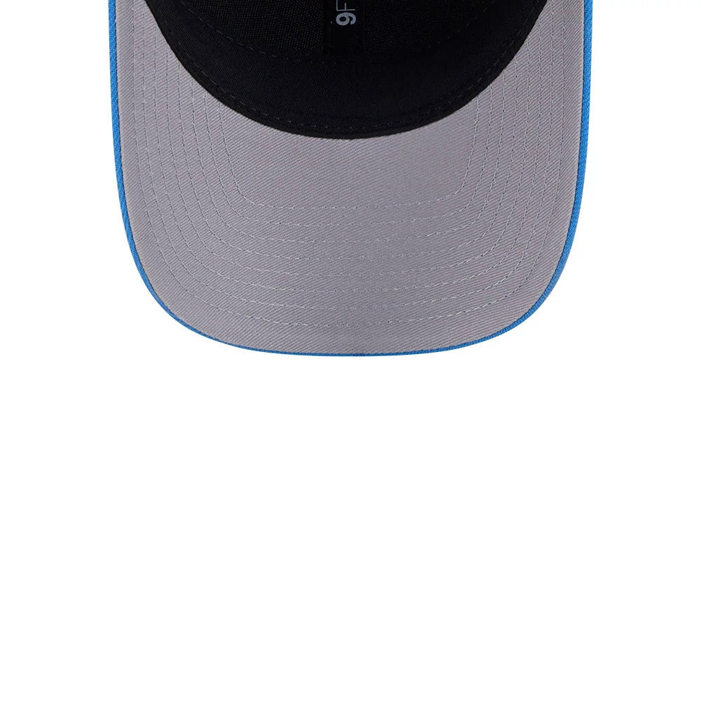St. Louis Blues NHL Team Blue New Era 9FORTY M-Crown Adjustable Cap, inside view showing the black sweatband with 9FORTY label and the grey undervisor, highlighting the blue rim along the visor edge.