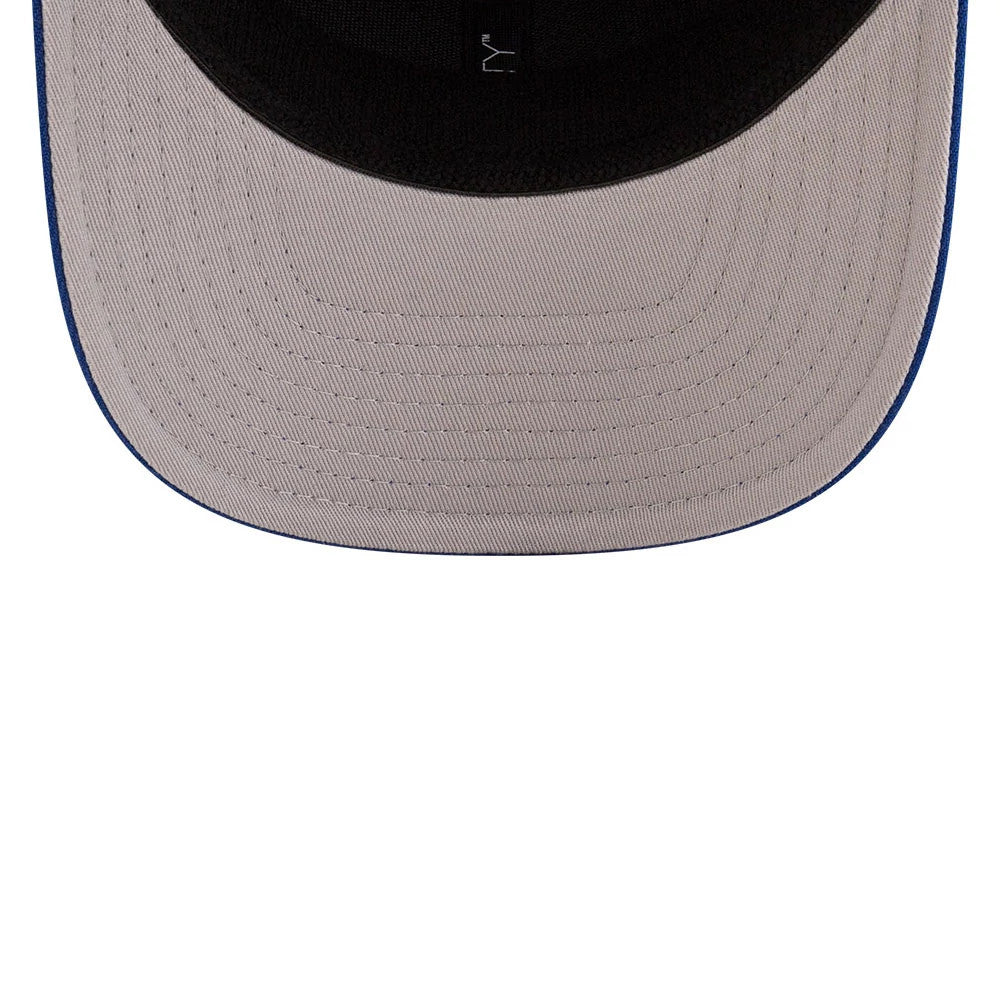 New York Islanders NHL Team Blue New Era 9SEVENTY Stretch Snap Adjustable Cap, inside view showing the grey undervisor with black taping and sweatband, featuring a New Era logo tag.