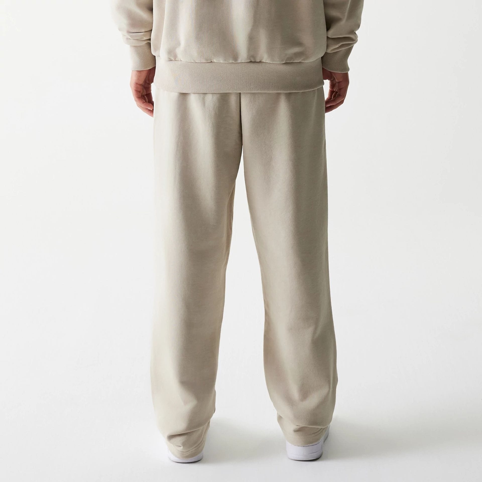 The Male model is wearing McLaren Racing Light Beige Straight Leg Joggers 2