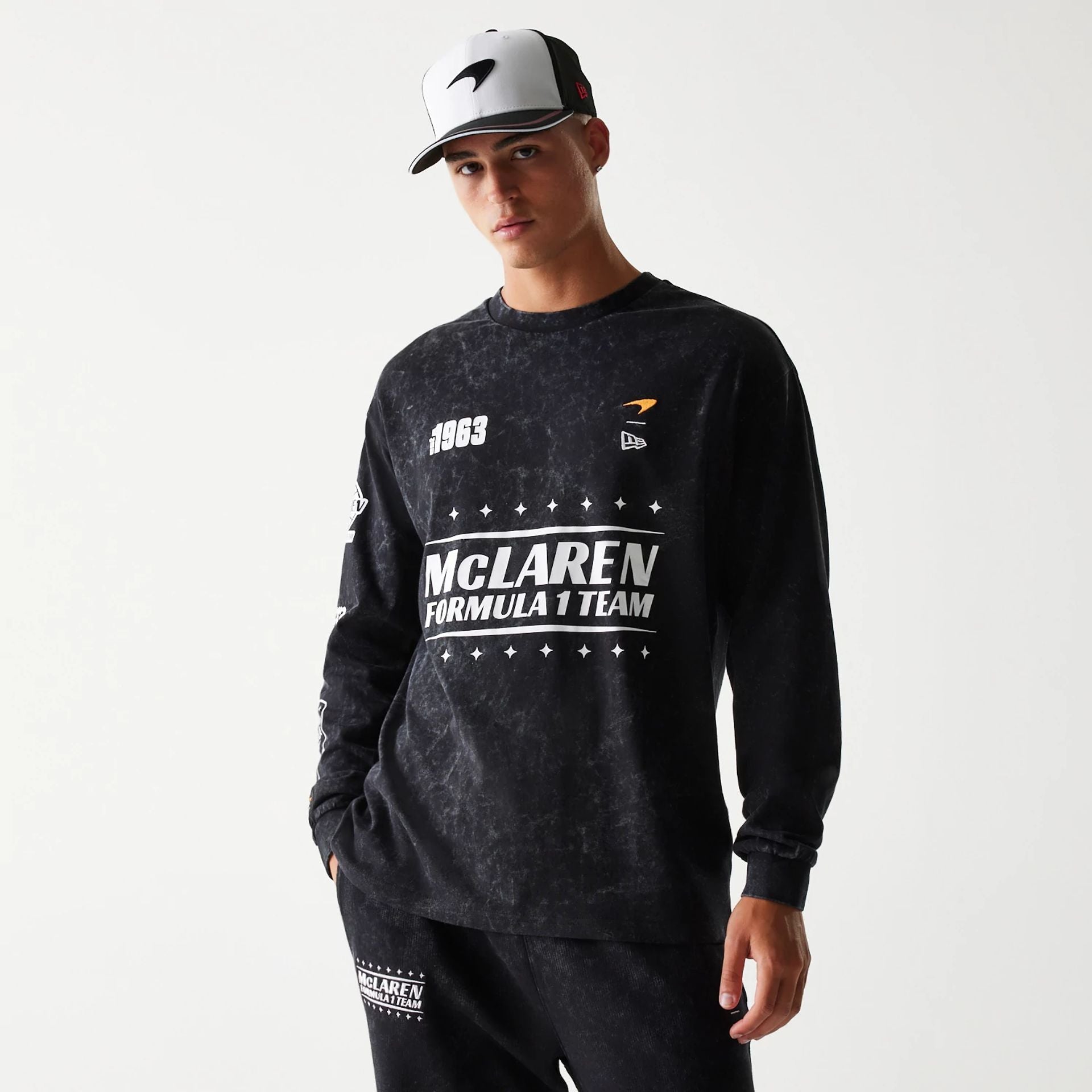 The Male model is wearing McLaren Racing Black Long Sleeve T-Shirt 1