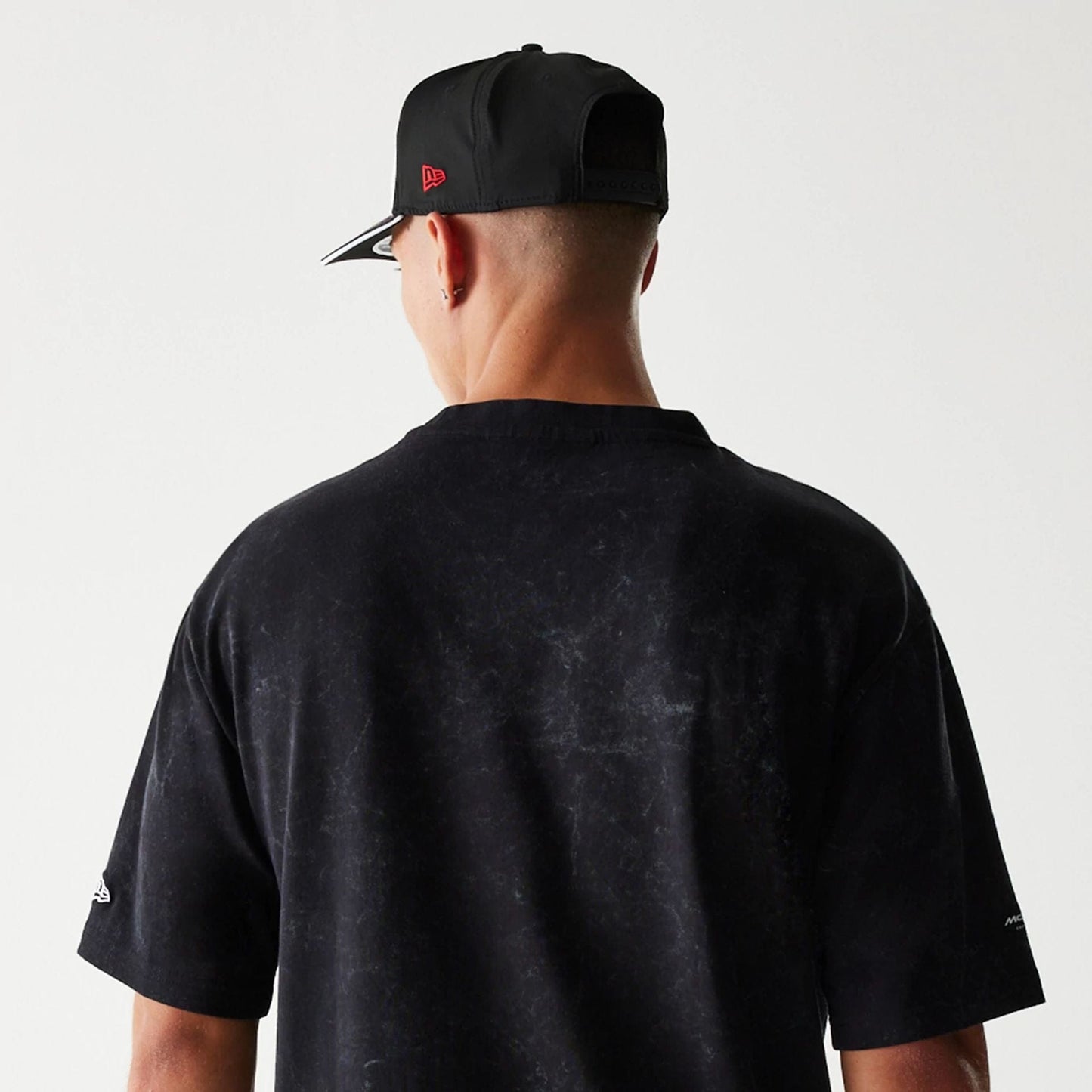 The Male model is wearing McLaren Racing Washed Graphic Black Oversized T-Shirt 7