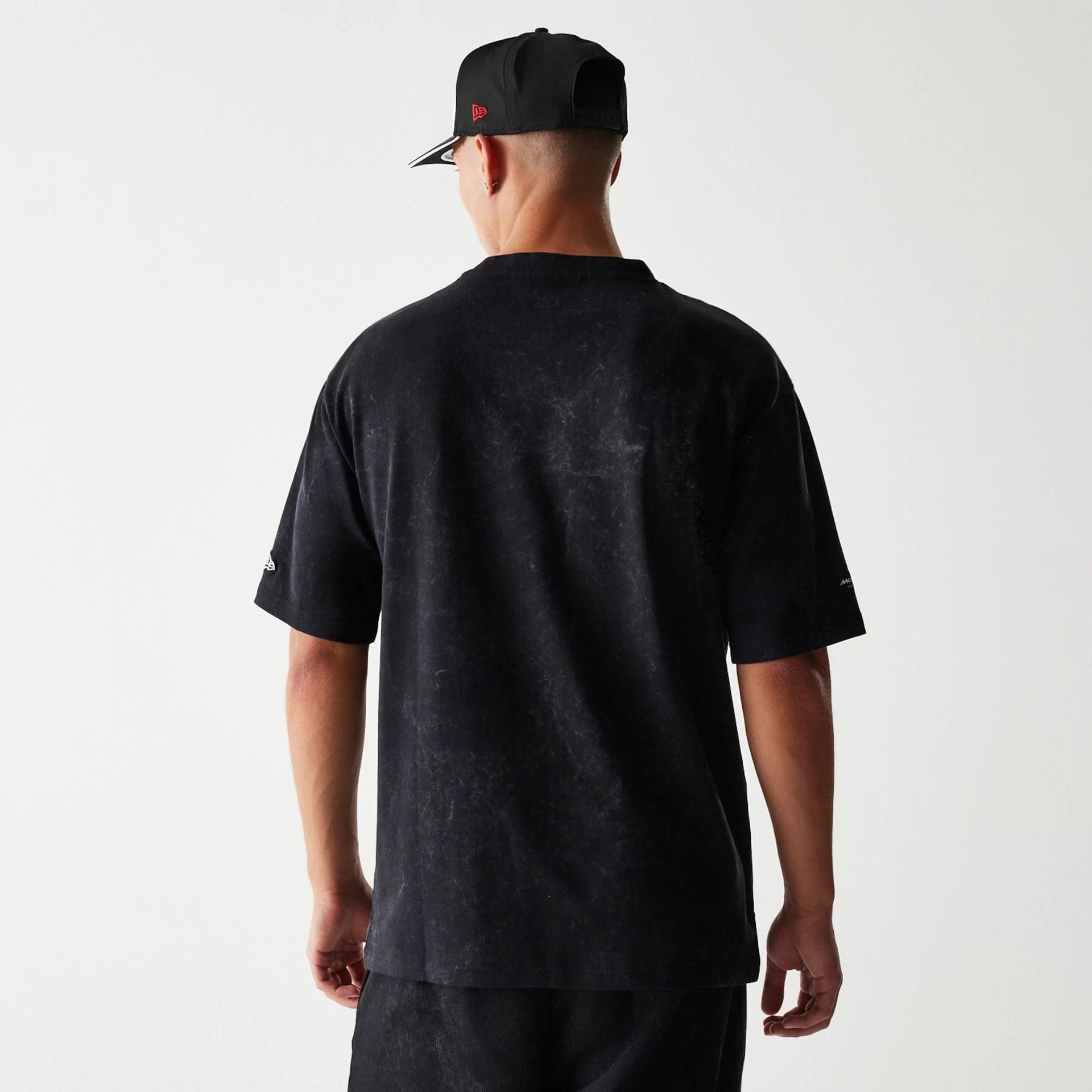 The Male model is wearing McLaren Racing Washed Graphic Black Oversized T-Shirt 2