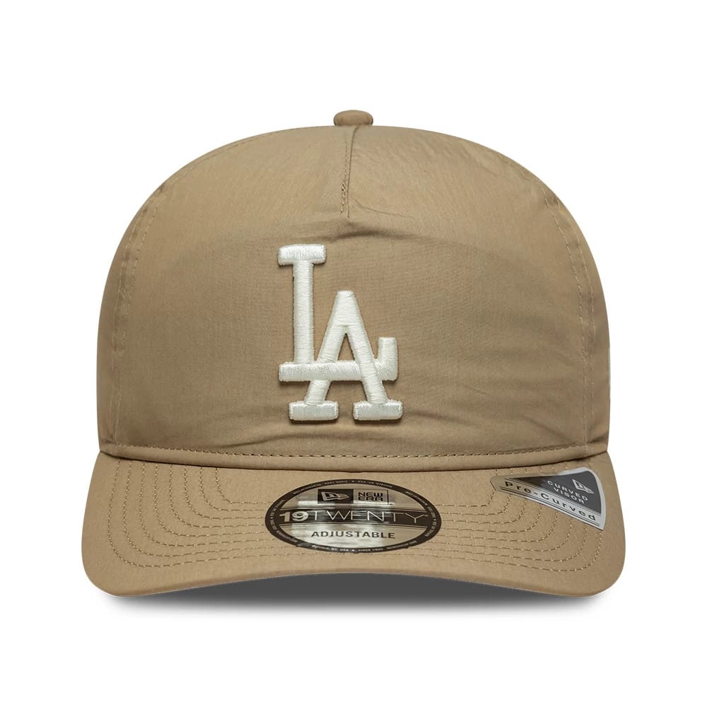LA Dodgers MLB Nylon Open Beige New Era 19TWENTY Adjustable Cap, front view showing the white embroidered LA logo on the structured beige crown, with a matching visor featuring the 19TWENTY size sticker on top.