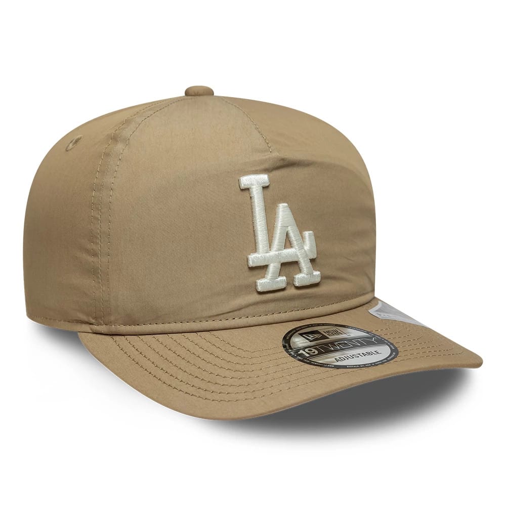 LA Dodgers MLB Nylon Open Beige New Era 19TWENTY Adjustable Cap, three-quarter view showing the raised white LA logo on the front panel, with a curved beige visor and a 19TWENTY size sticker on top.