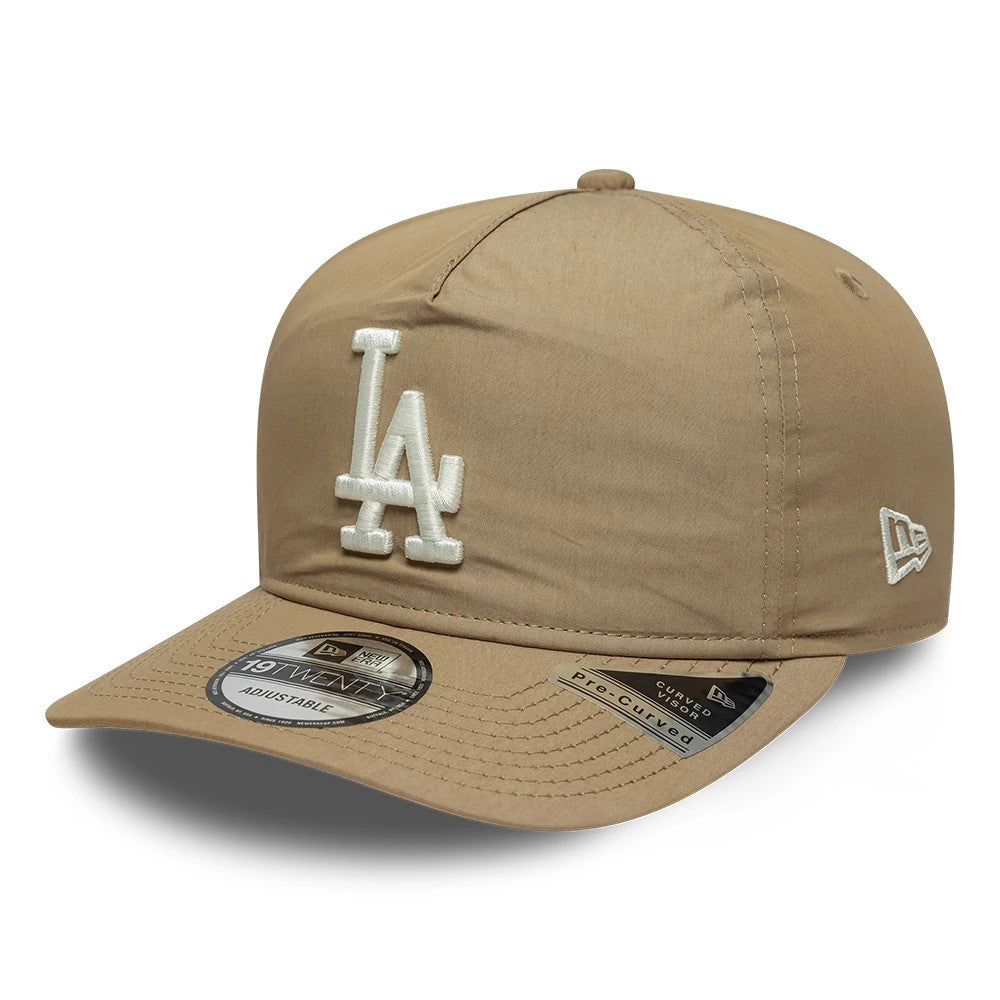 LA Dodgers MLB Nylon Open Beige New Era 19TWENTY Adjustable Cap, front view showing raised white embroidered LA logo on the front panel, beige pre-curved visor with a 19TWENTY size sticker and New Era flag logo on the left side.