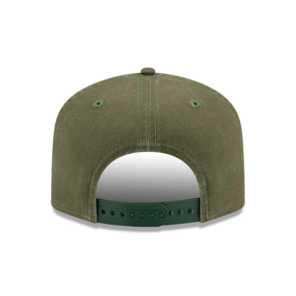 Green Bay Packers NFL Championship Dark Green New Era 19TWENTY Adjustable Cap, rear view showing the dark green adjustable strap and matching eyelets on the soft green unstructured crown.
