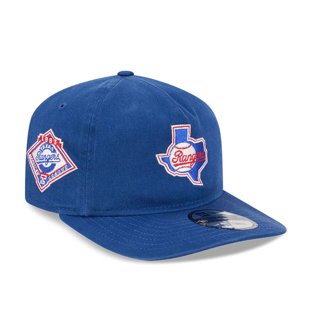 Texas Rangers MLB Championship Blue New Era 19TWENTY Adjustable Cap, three-quarter view showing a white embroidered Texas and Rangers logo on the front panel, with a blue flat visor and a 19TWENTY size sticker on the visor.