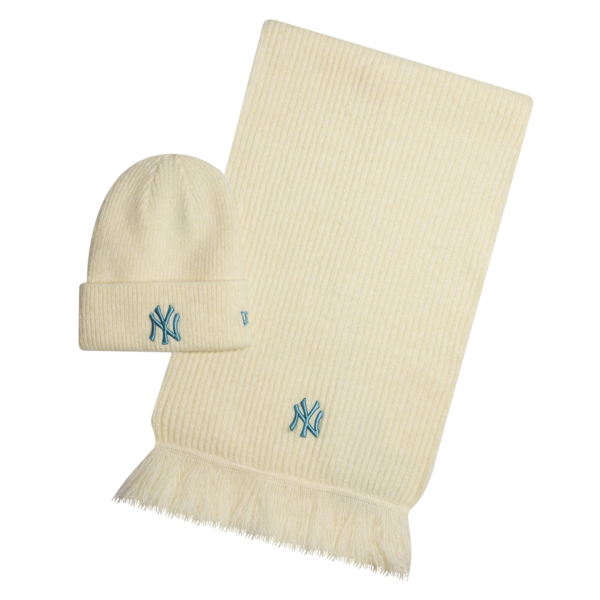 New Era New York Yankees MLB Cream Beanie & Scarf Set, front view with light blue embroidered Yankees logos on the cuffed beanie and the end of the ribbed scarf, both in cream with fringed edges on the scarf.
