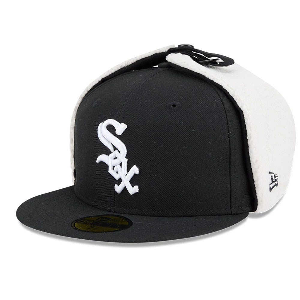 Chicago White Sox MLB Classic Black Dogear New Era 59FIFTY Fitted Cap, three-quarter view showing the raised white Sox logo on the front panel, black flat visor with gold 59FIFTY size sticker, and cream dogear flaps with black buckle.