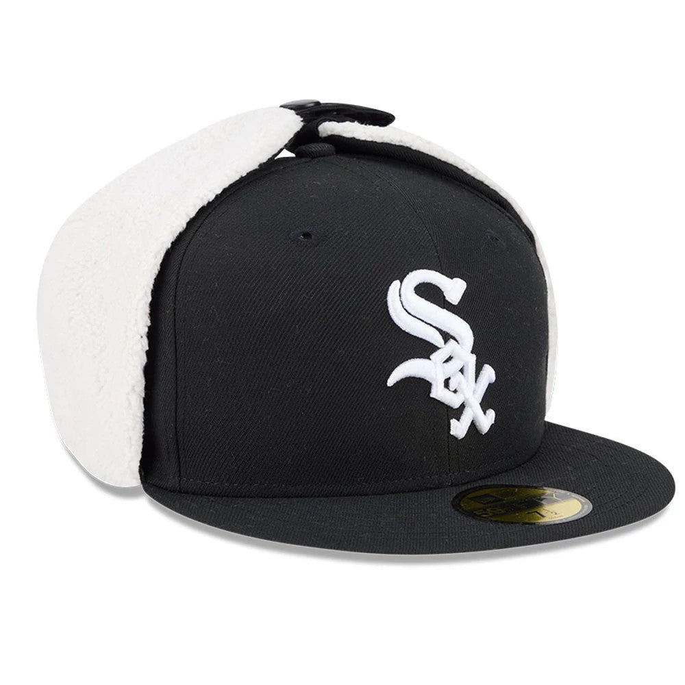 Chicago White Sox MLB Classic Black Dogear New Era 59FIFTY Fitted Cap, three-quarter view showing the white embroidered Sox logo on the black front panel, with contrasting white dog ear flaps and a gold 59FIFTY size sticker on the visor.