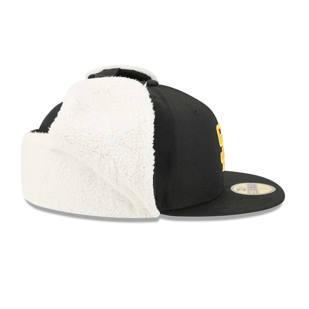 San Diego Padres MLB Classic Black Dogear New Era 59FIFTY Fitted Cap, side view showing the gold team logo in raised embroidery on the black front panel, with white shearling dogear flaps down, and a black flat visor with a gold 59FIFTY size sticker.