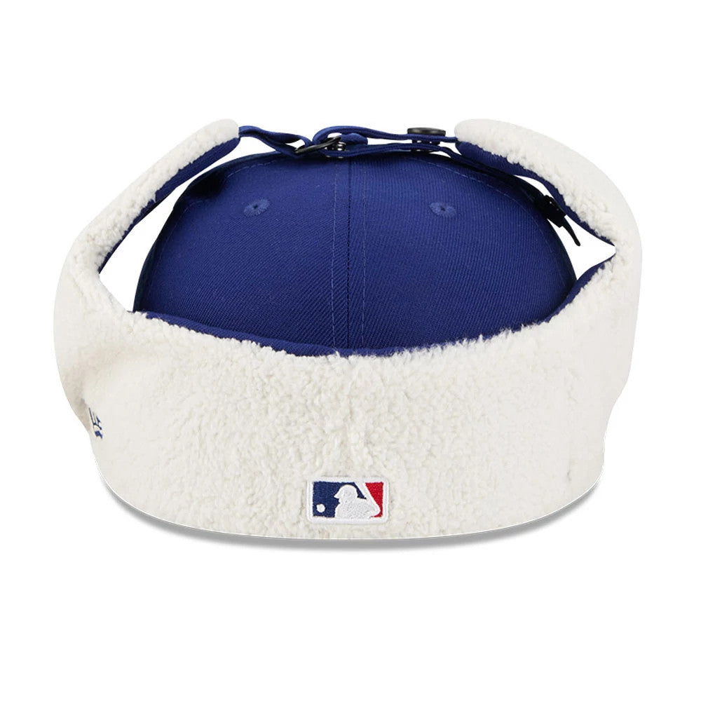 LA Dodgers MLB Classic Dark Blue Dogear New Era 59FIFTY Fitted Cap, rear view showing the embroidered MLB Batterman logo at the centre back, with white shearling dogear flaps and a structured dark blue crown.