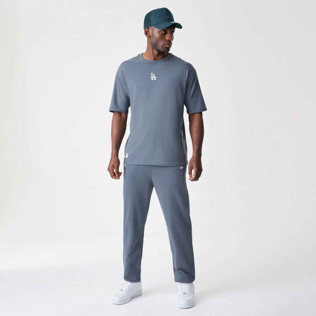 The Male model is wearing LA Dodgers MLB Midi League Essential Dark Grey Oversized T-Shirt 8