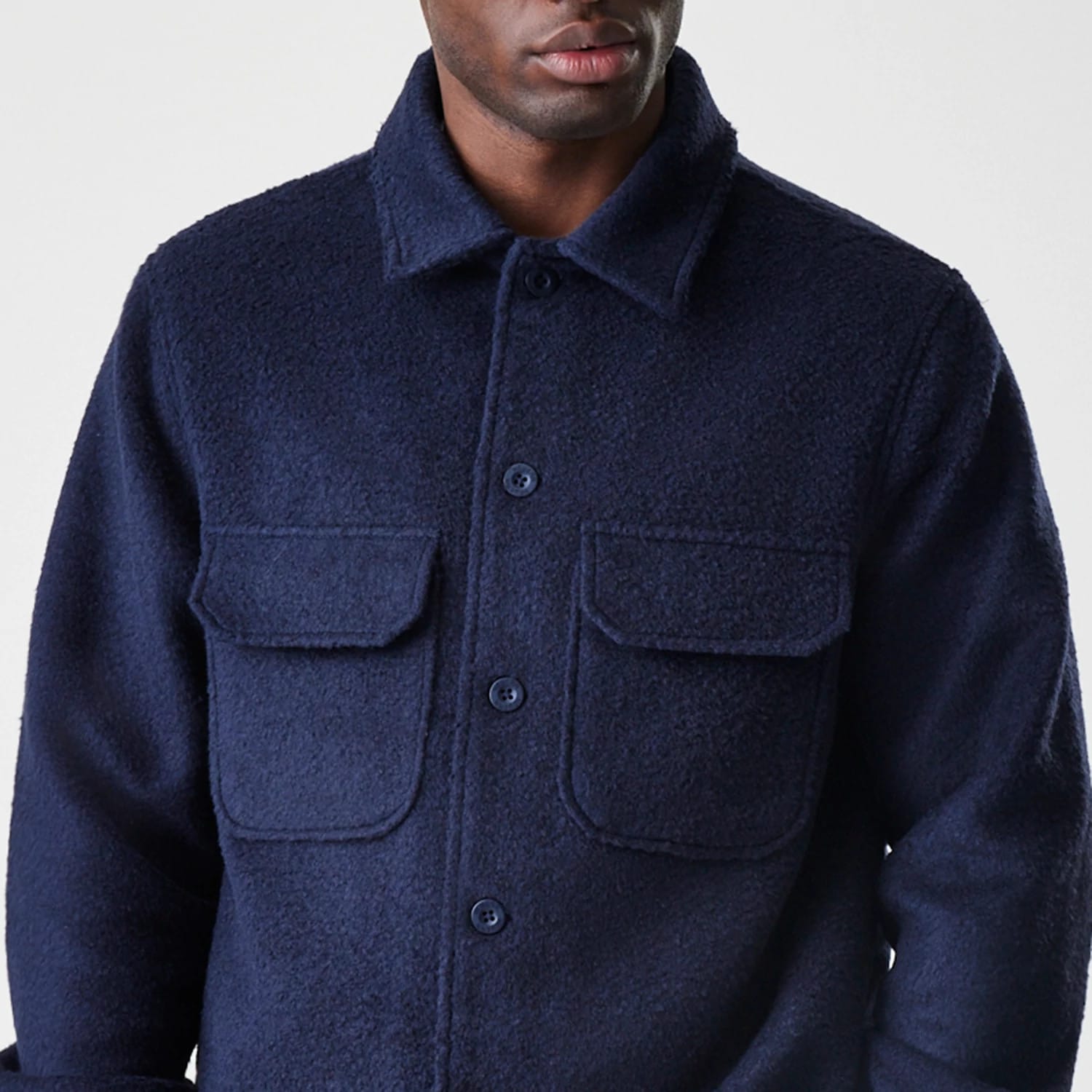 The Male model is wearing New Era Borg Navy Shacket 3