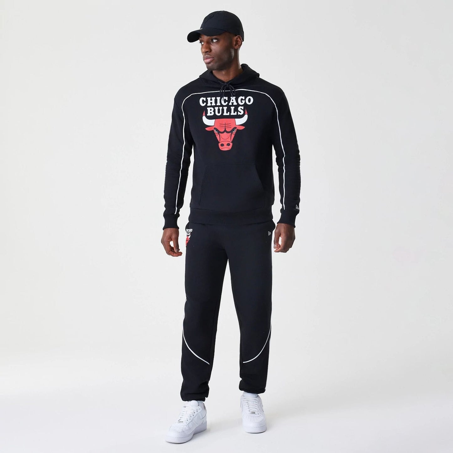 The Male model is wearing Chicago Bulls NBA Piping Black Oversized Pullover Hoodie 8
