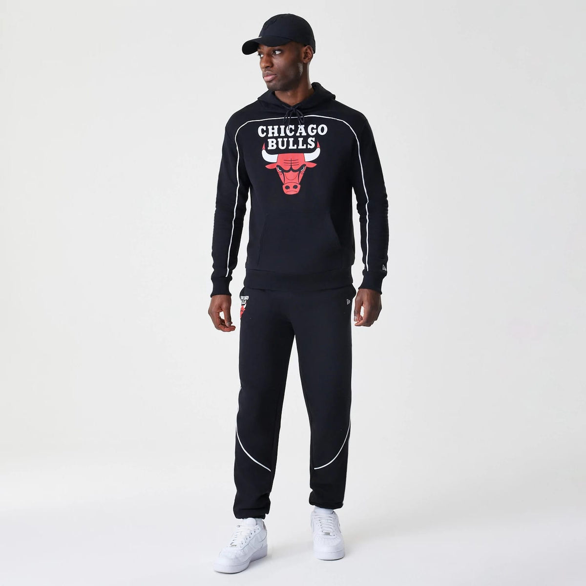 The Male model is wearing Chicago Bulls NBA Piping Black Oversized Pullover Hoodie 8