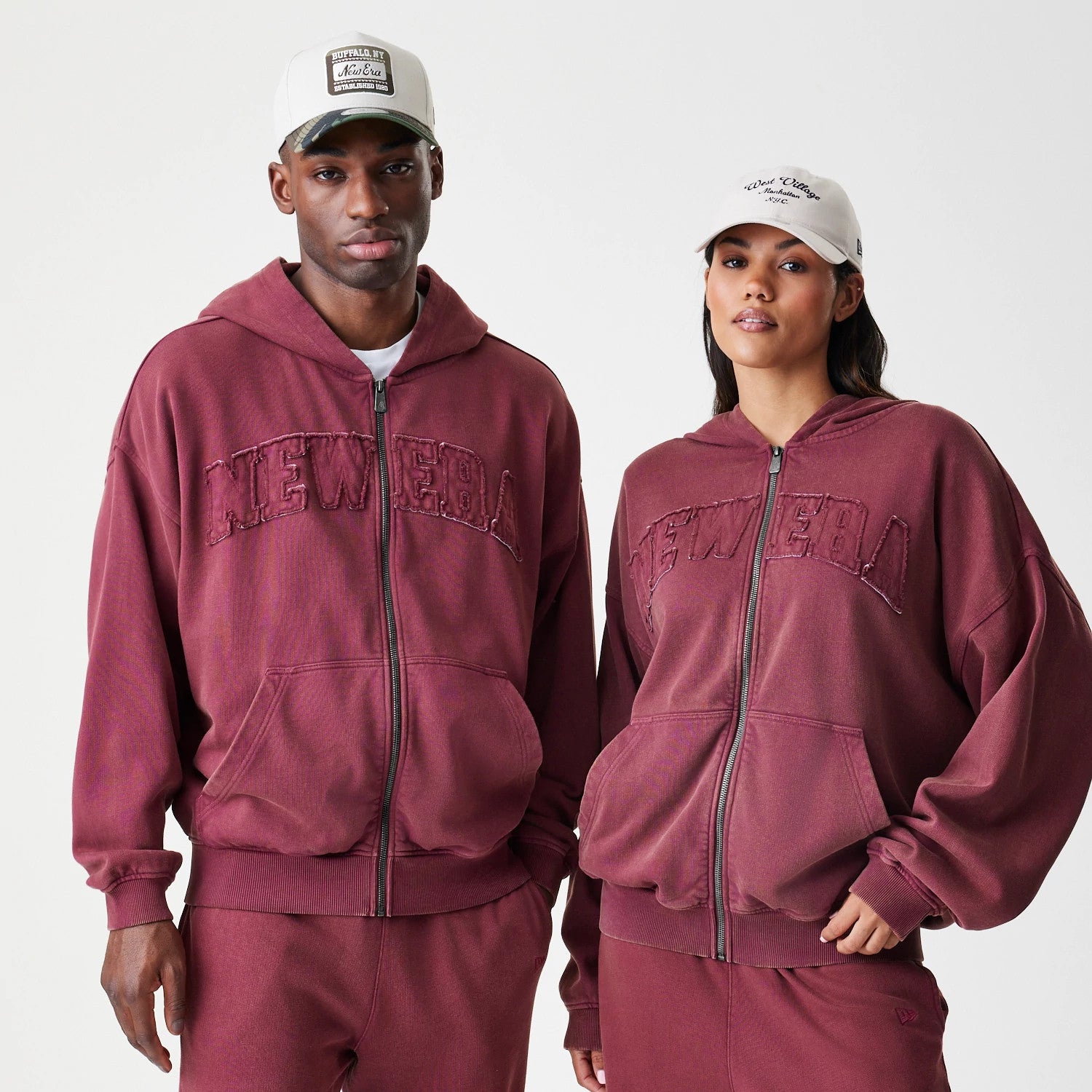 The Male model is wearing New Era Washed Dark Red Oversized Full Zip Hoodie 1