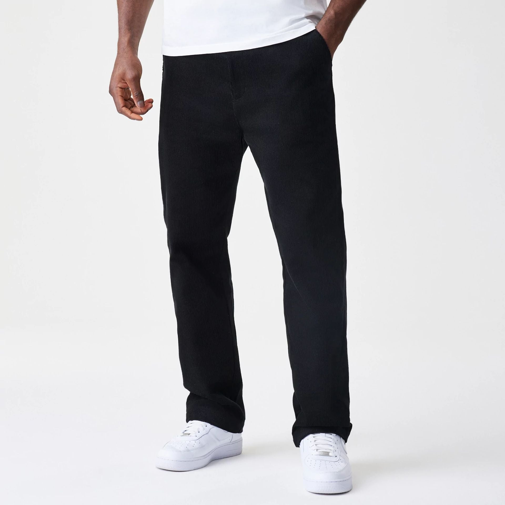 The Male model is wearing New Era Cord Black Straight Leg Chinos 1
