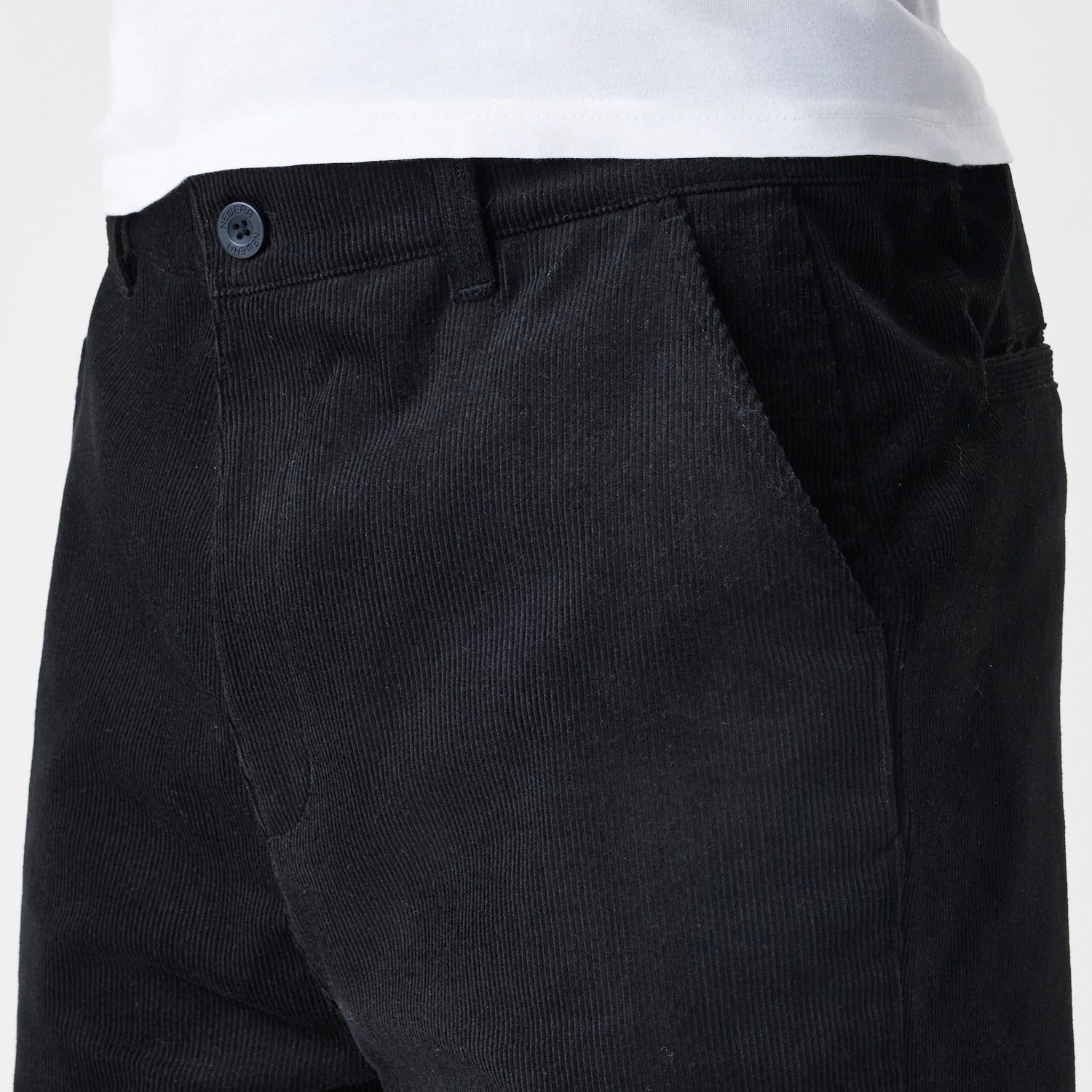 The Male model is wearing New Era Cord Black Straight Leg Chinos 3
