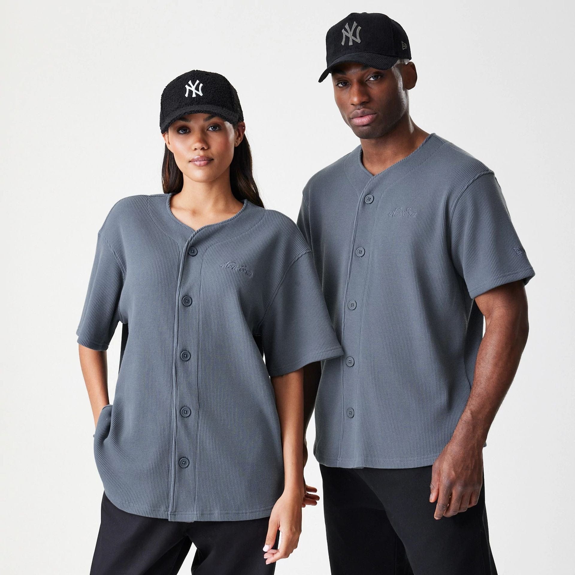 The Male model is wearing New Era Waffle Dark Grey Jersey 1