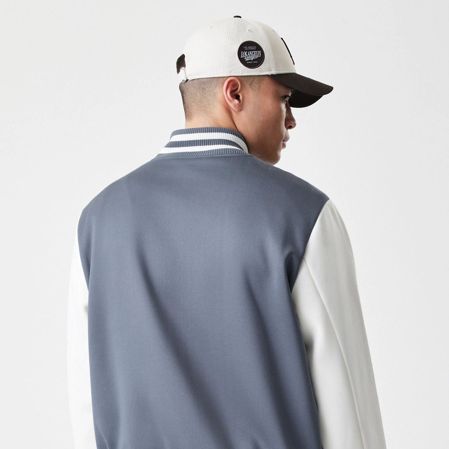 The Male model is wearing LA Dodgers MLB Dark Grey Varsity Jacket 7