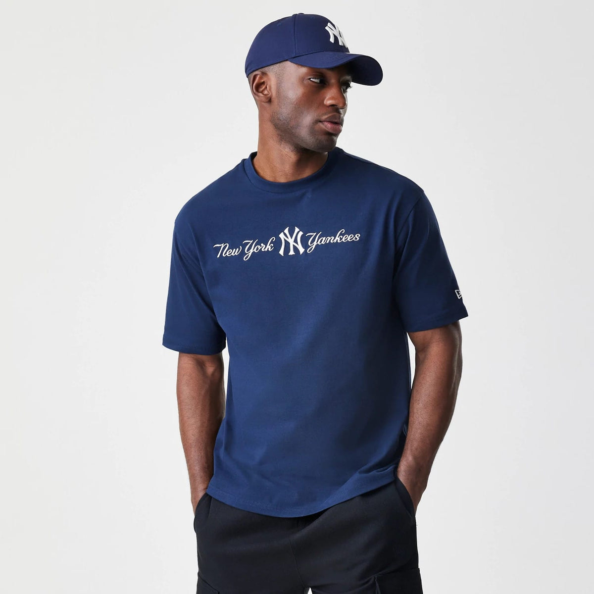 The Male model is wearing New York Yankees MLB Script Navy Oversized T-Shirt 1