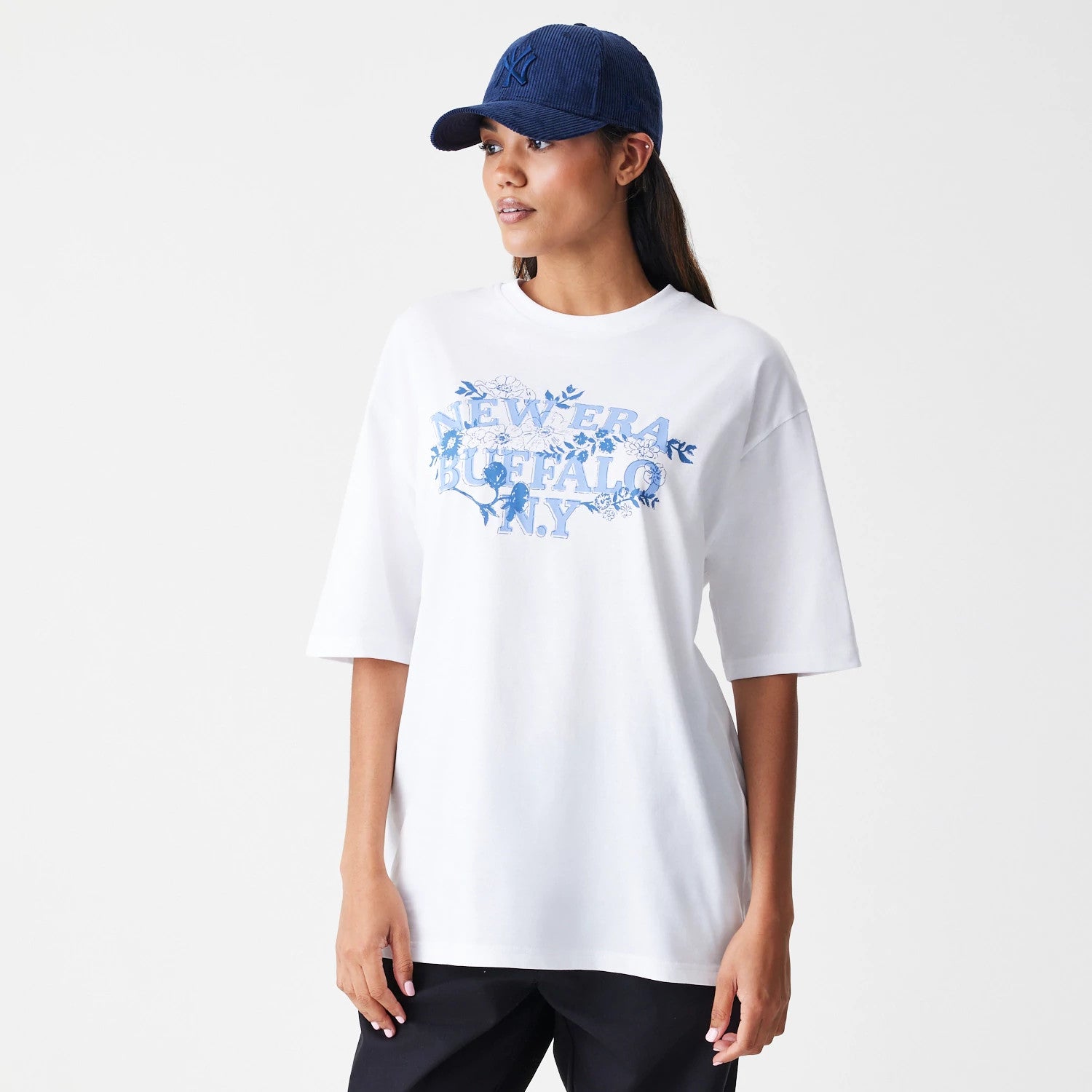 The Male model is wearing New Era Floral White Oversized T-Shirt 4