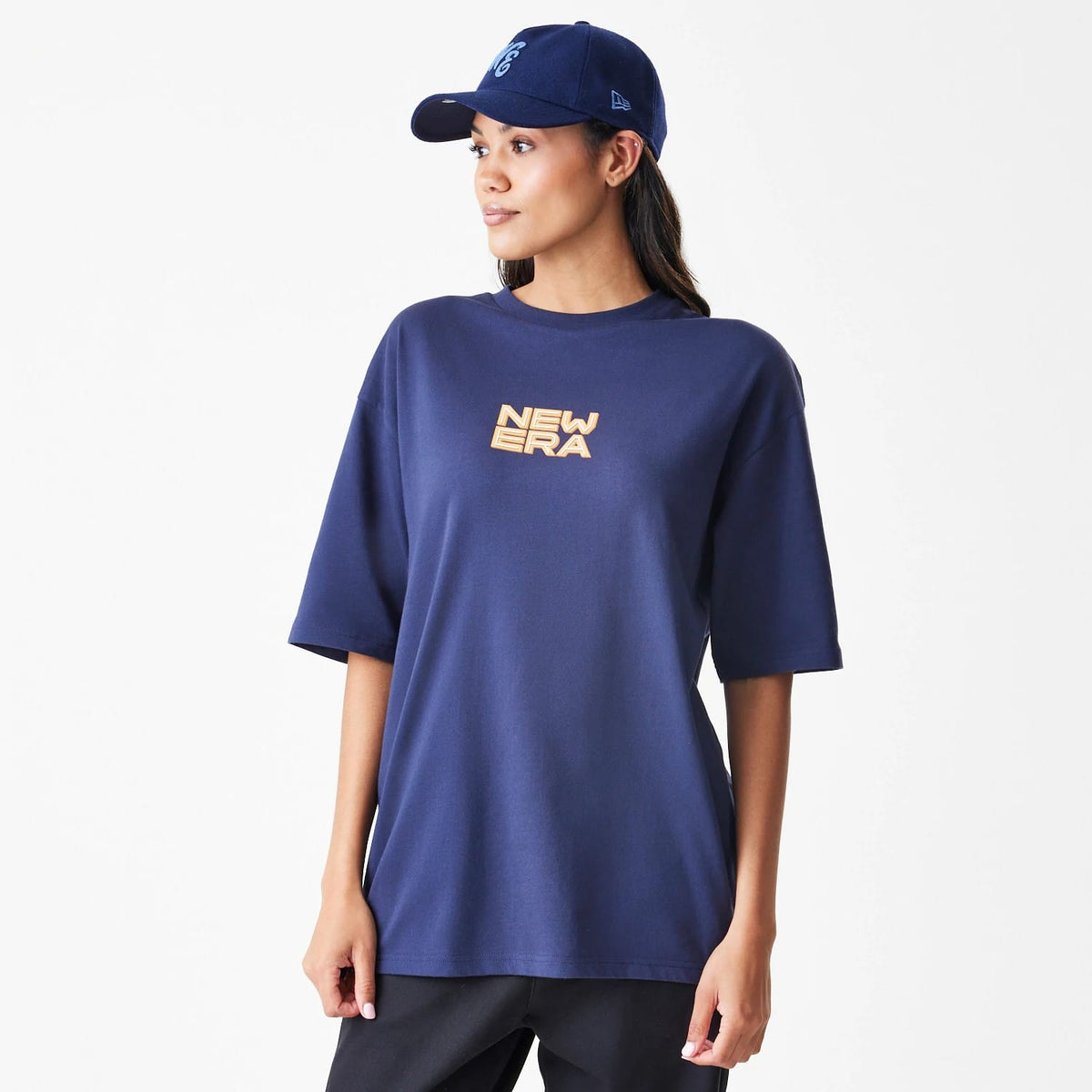 The Male model is wearing New Era Location Navy Oversized T-Shirt 4