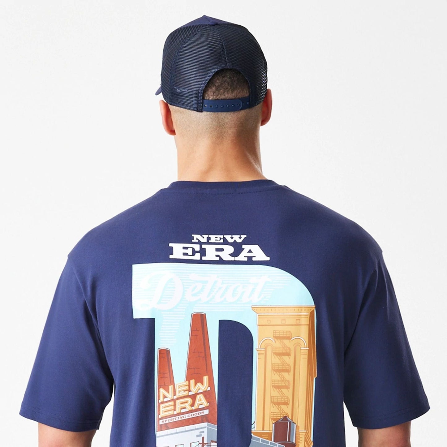 The Male model is wearing New Era Location Navy Oversized T-Shirt 8