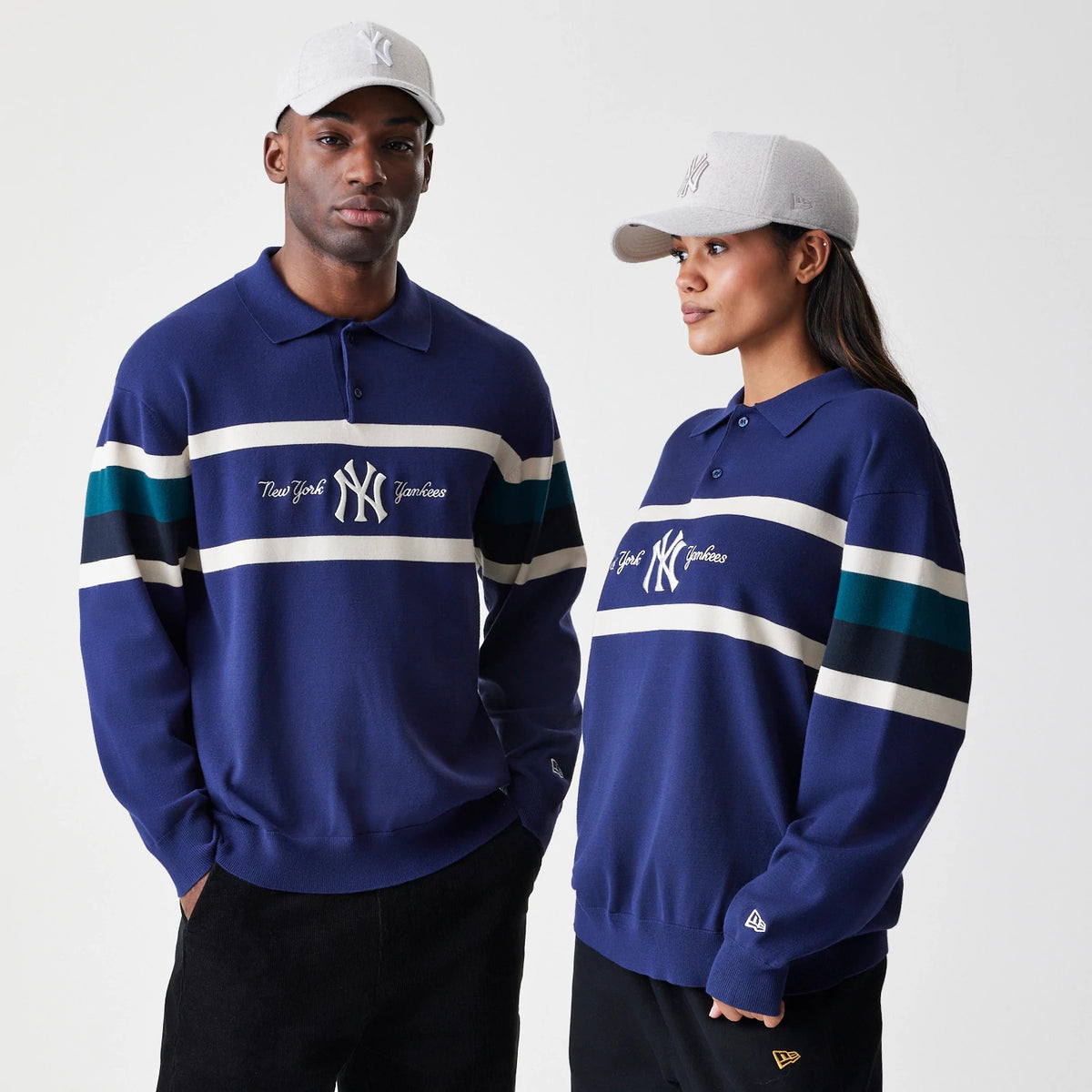 New Era New York Yankees MLB Knit Navy Rugby Shirt, on-model front view featuring embroidered New York Yankees lettering on the chest, navy and white horizontal stripes on the sleeves, and the New Era flag logo on the left cuff.