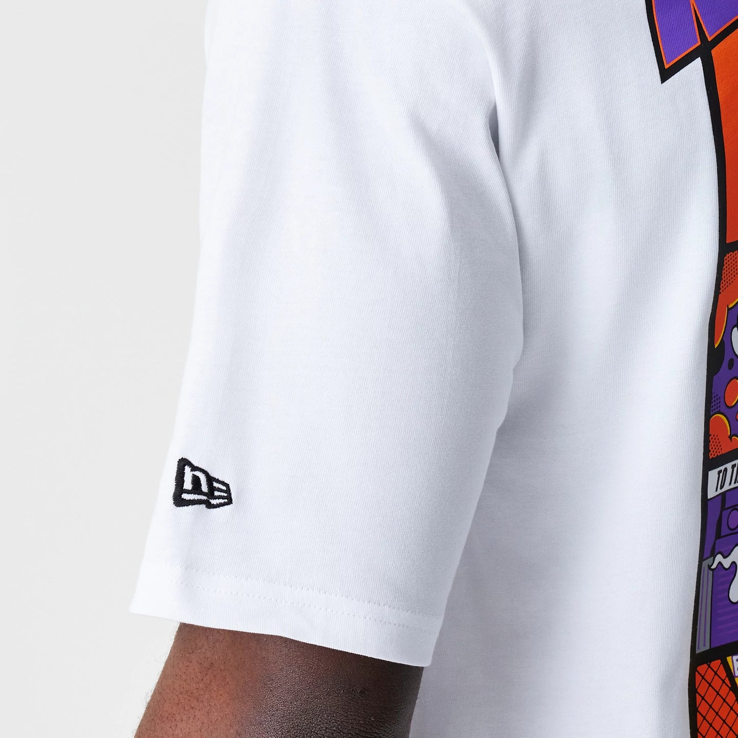 The Male model is wearing New Era Location White Oversized T-Shirt 7