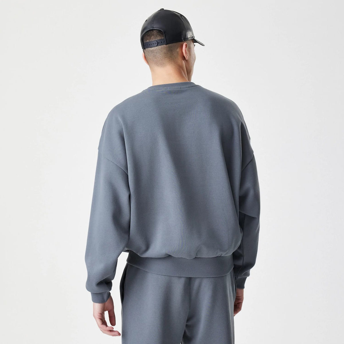 The Male model is wearing LA Lakers NBA Linear Dark Grey Crew Neck Sweater 2